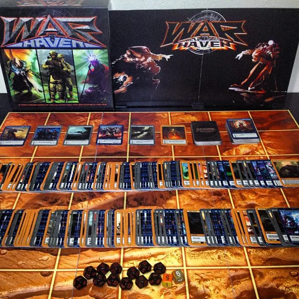 Printed War Haven tabletop prototype, with game board, cards and presentation packaging